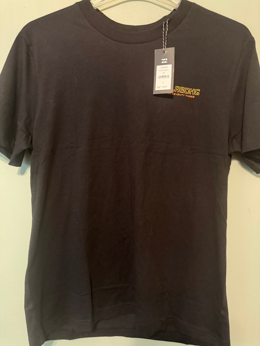 Billabong Men's Black Tee with Small Gold Logo